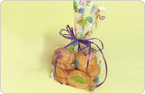 Bag of cookies with purple ribbon